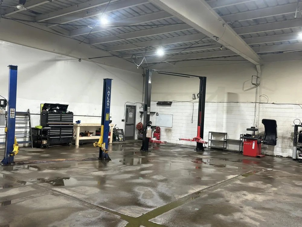 The AutoNorth service bays with two hoists and a tire balancer