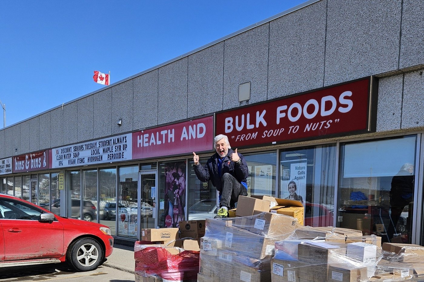 The Bins & Bins health and bulk foods storefront in North Bay on a sunny day