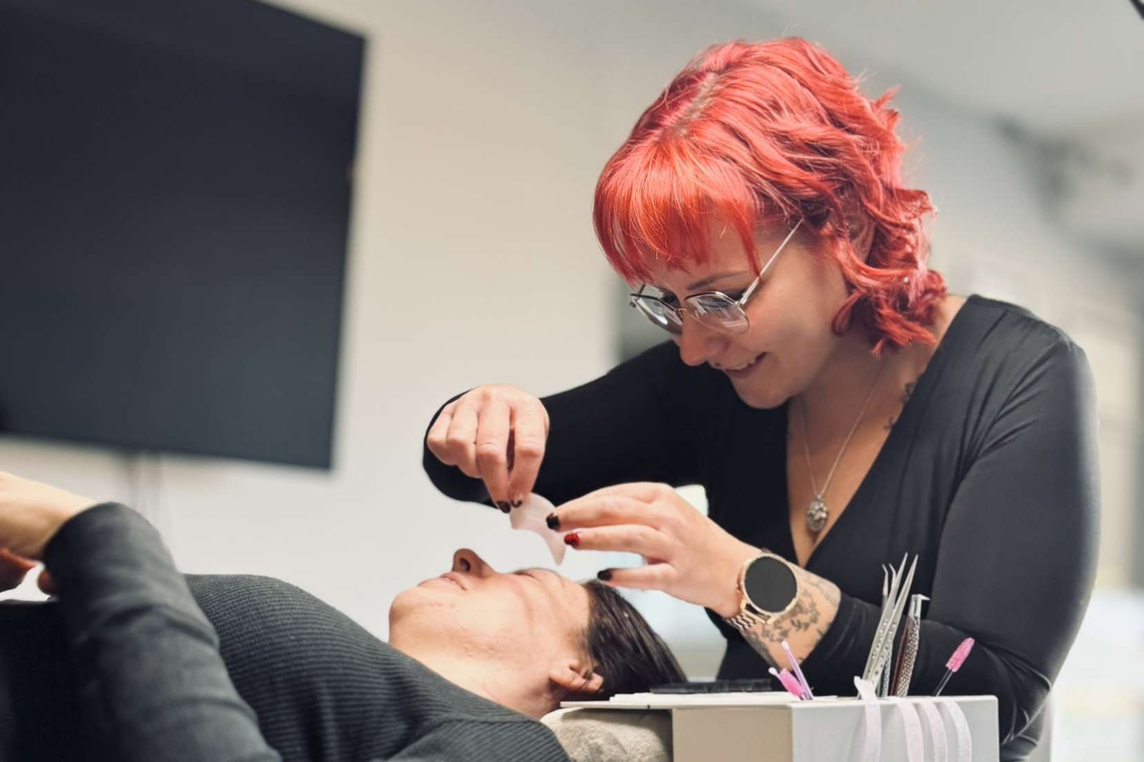 Brea Page applying lash extensions to a client at Brea's Beauty Boutique in North Bay