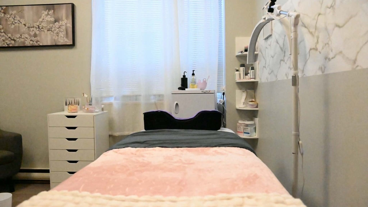 Treatment bed and esthetics equipment in the private room at Brea's Beauty Boutique