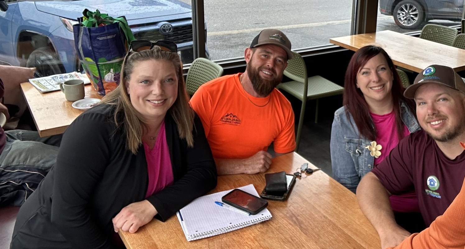 Sarah, Jeremy, Sarah and Lucas of Garland's Property Care and Garland's Property Maintenance at coffee in North Bay