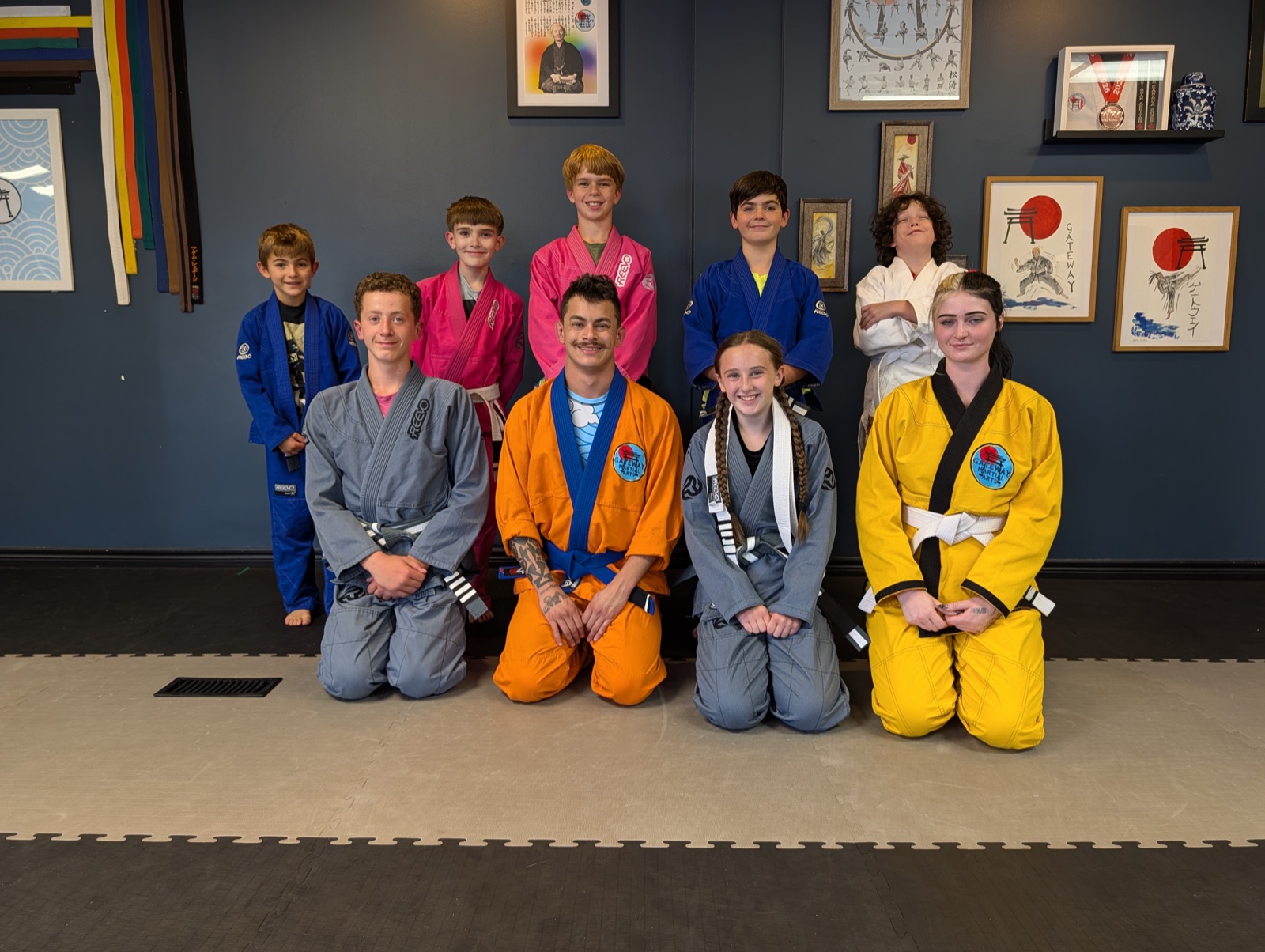A Gateway Martial Arts Brazilian Jiu Jitsu class lined up on the mat at the dojo in North Bay