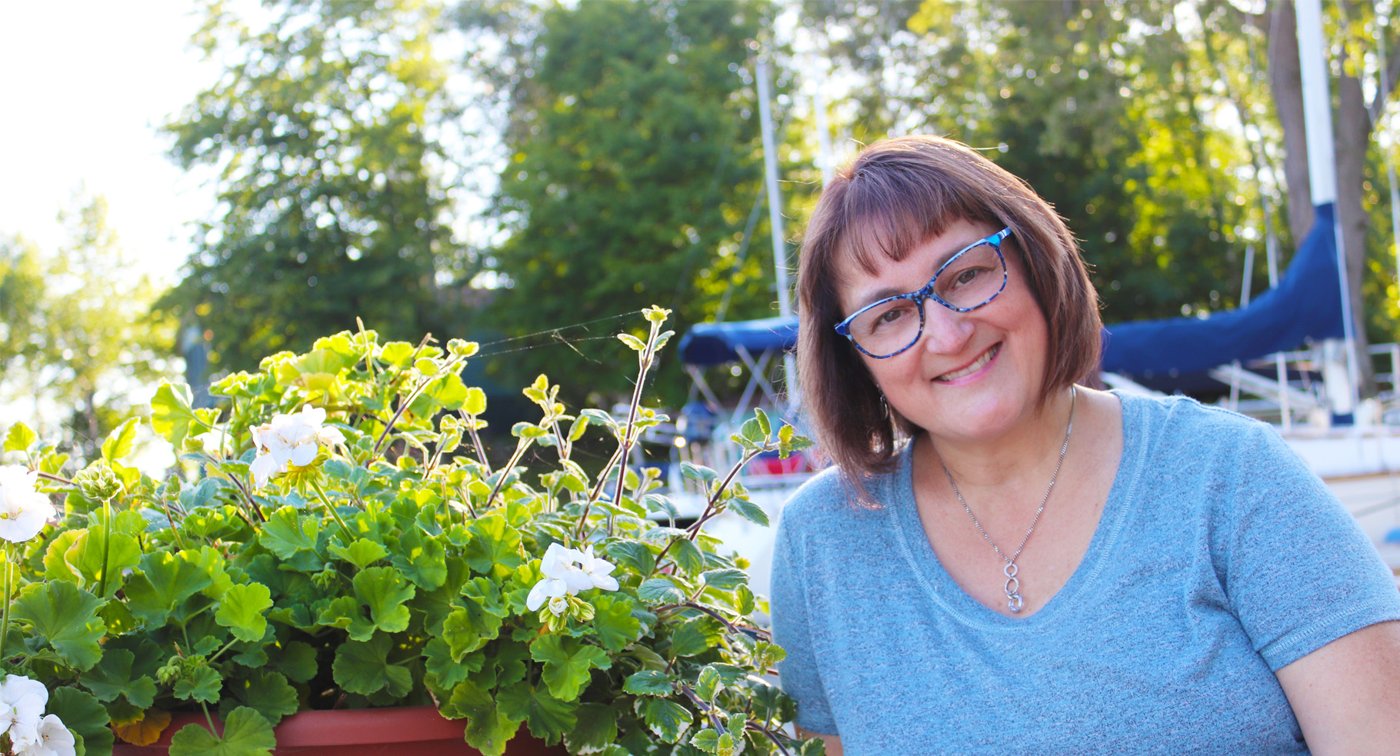 Darlene Tripp, owner of Hello Darlene, by the water in North Bay