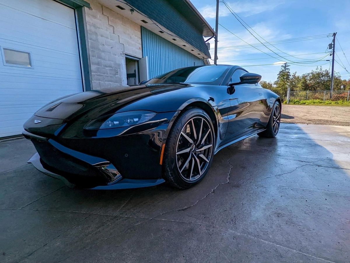 A black sports car freshly detailed outside the Northern Detail & Polish shop in North Bay