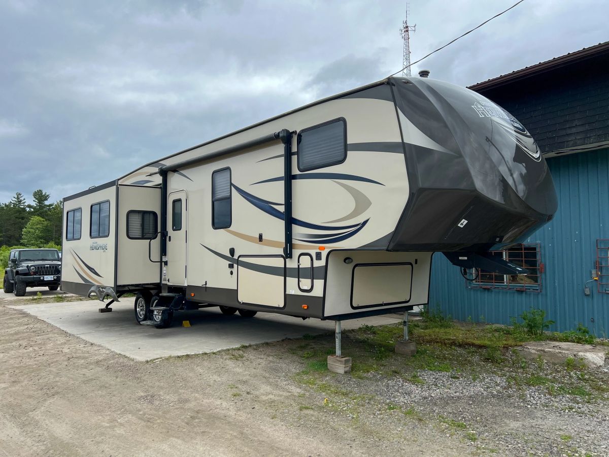 A fifth wheel trailer detailed by Northern Detail & Polish